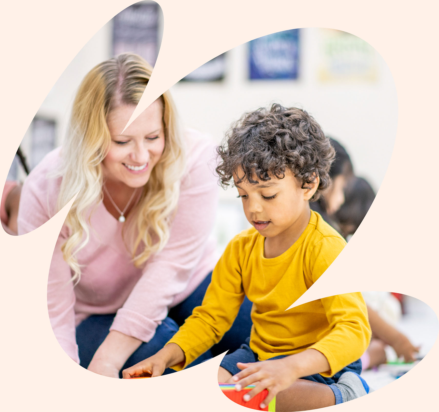 Pediatric therapist guiding child through fine motor play activity to support early development and school readiness