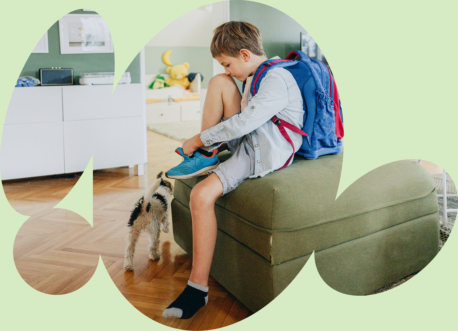 Child practicing independence by putting on shoes before school to build daily living skills through occupational therapy